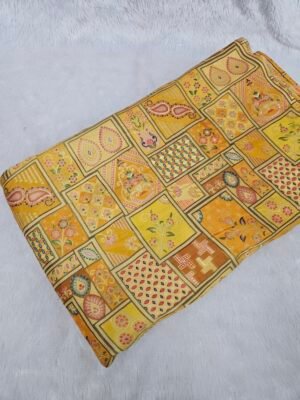 YELLOW JAQUARD POSITION PRINT ON DOLA SILK FABRIC