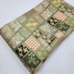 JAQUARD POSITION PRINT ON DOLA SILK FABRIC